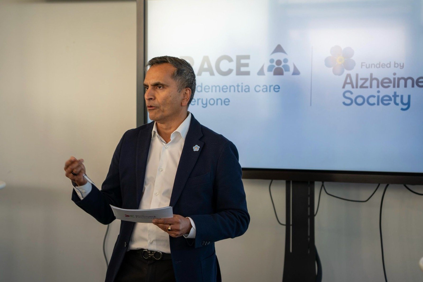 Avnish presenting at an Alzheimer's Society event